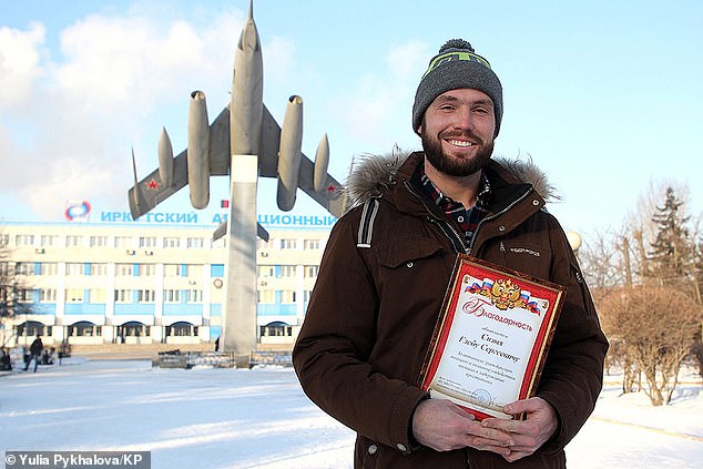 Gleb Sizykh, 28, was honoured by Russian police for chasing down the convicted rapist
