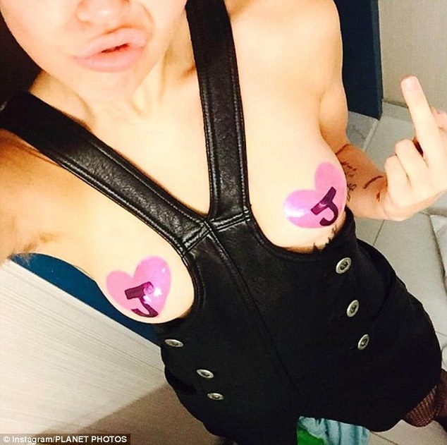 Singer Miley Cyrus this week shocked fans with this photo by challenging convention - and leaving her underarms unshaved