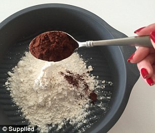 Simple: To start, flour, cocoa powder, salt and sugar is added to a small nine-inch round pan